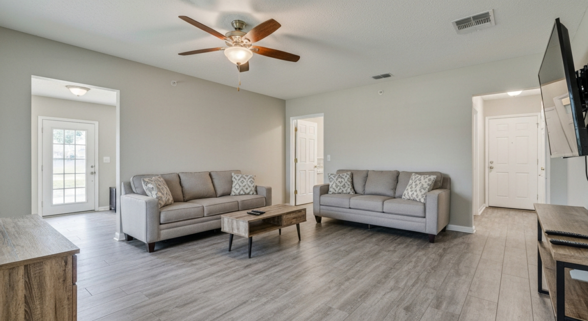A spotless, inspection-ready living room in an Orlando rental property post move-out cleaning.